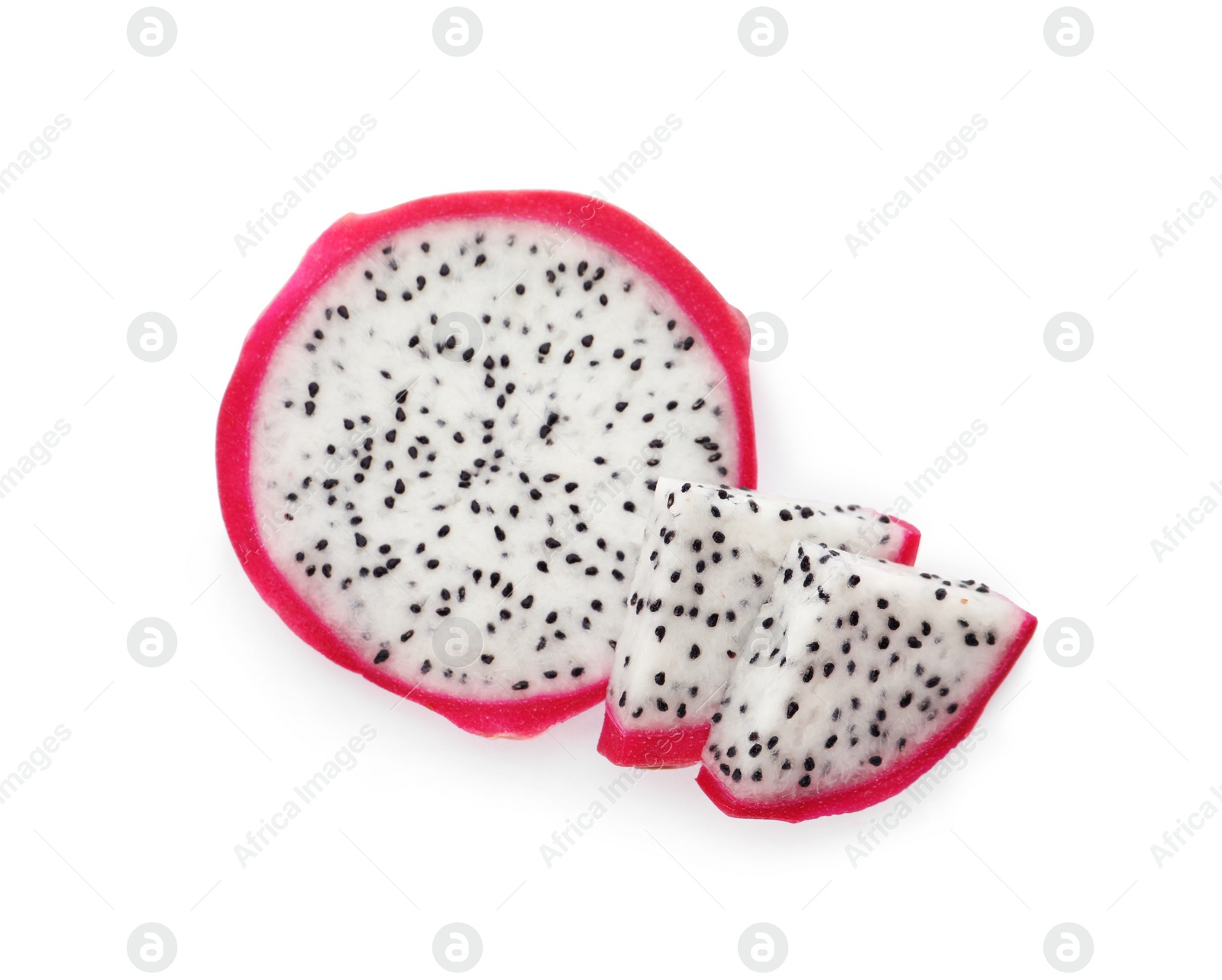 Photo of Slices of delicious ripe dragon fruit (pitahaya) on white background, top view