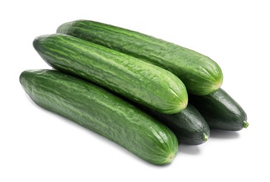 Photo of Many long fresh cucumbers isolated on white