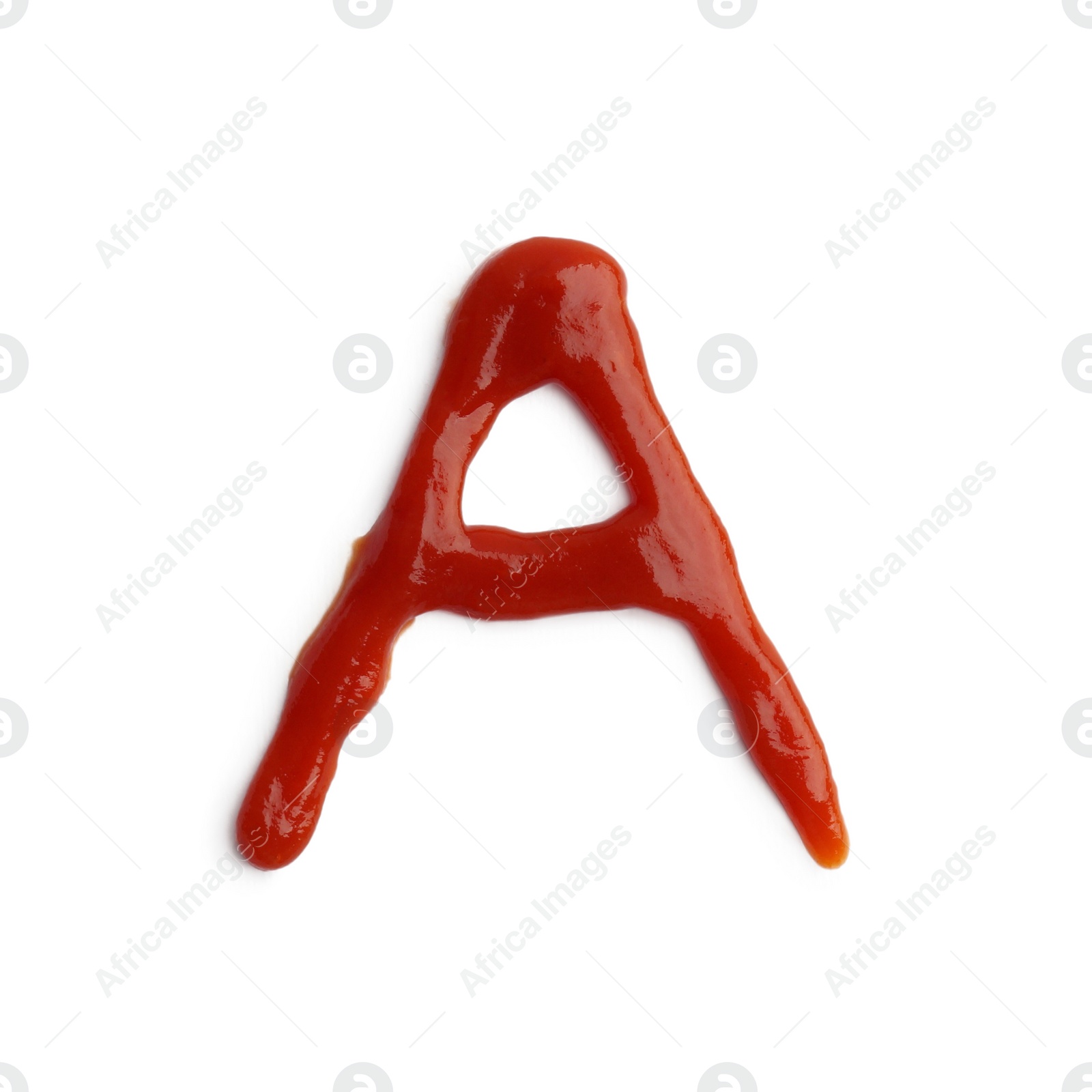 Photo of Letter A written with ketchup on white background