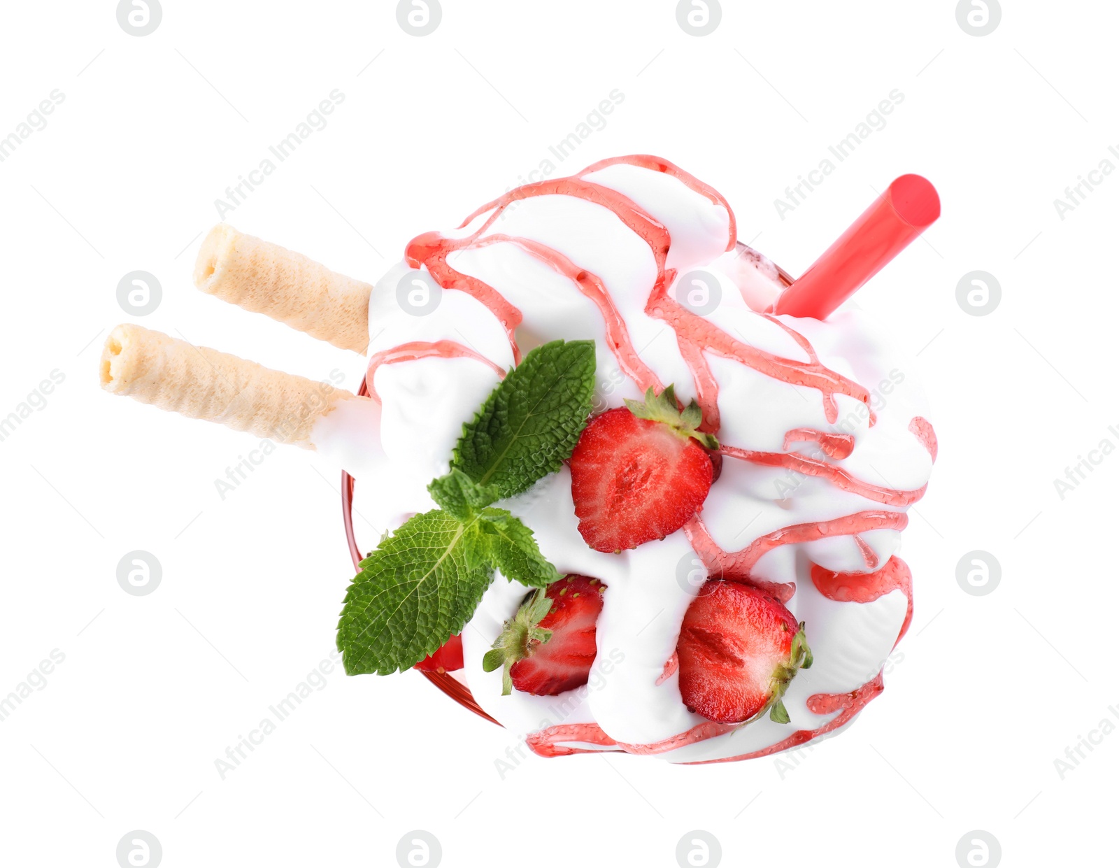 Photo of Tasty milk shake with strawberries in glass on white background, top view