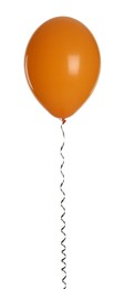 Photo of Orange balloon with ribbon isolated on white