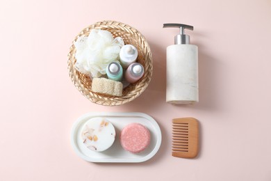 Photo of Bath accessories. Flat lay composition with personal care products on pink background