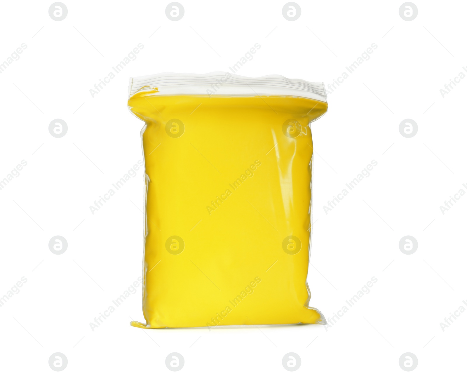 Photo of Package of yellow play dough isolated on white