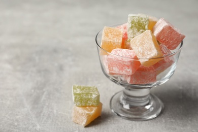 Photo of Turkish delight dessert on light table. Space for text