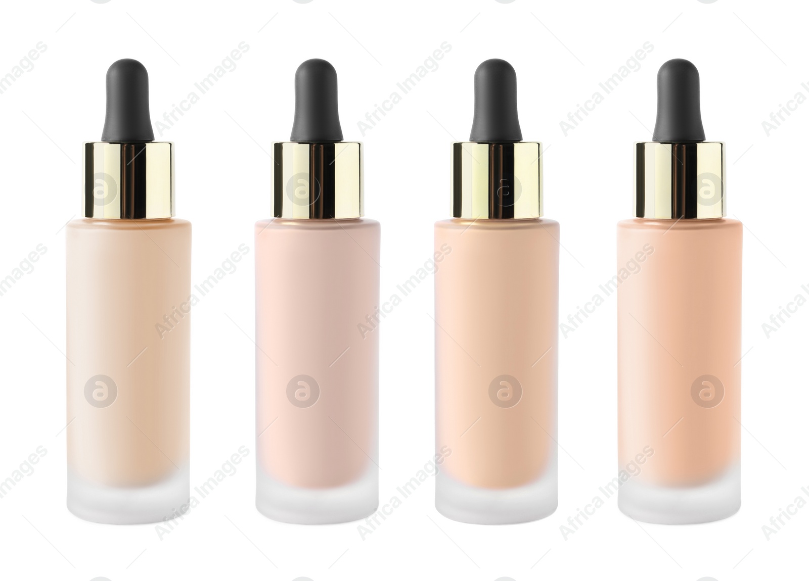 Image of Set of liquid foundations in different shades isolated on white