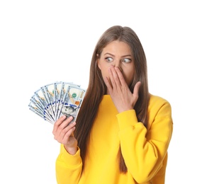 Excited young woman with money on white background