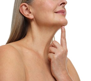 Mature woman with healthy skin on white background, closeup