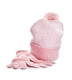 Photo of Pink woolen gloves and hat on white background. Winter clothes