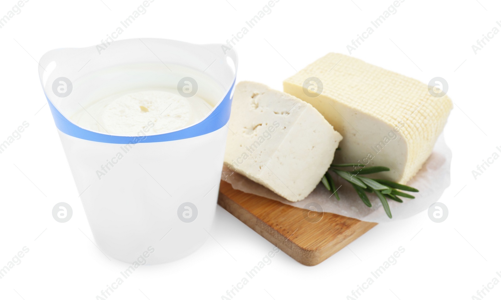 Photo of Tasty tofu with rosemary and cream cheese on white background