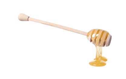 Photo of Natural honey dripping from dipper on white background