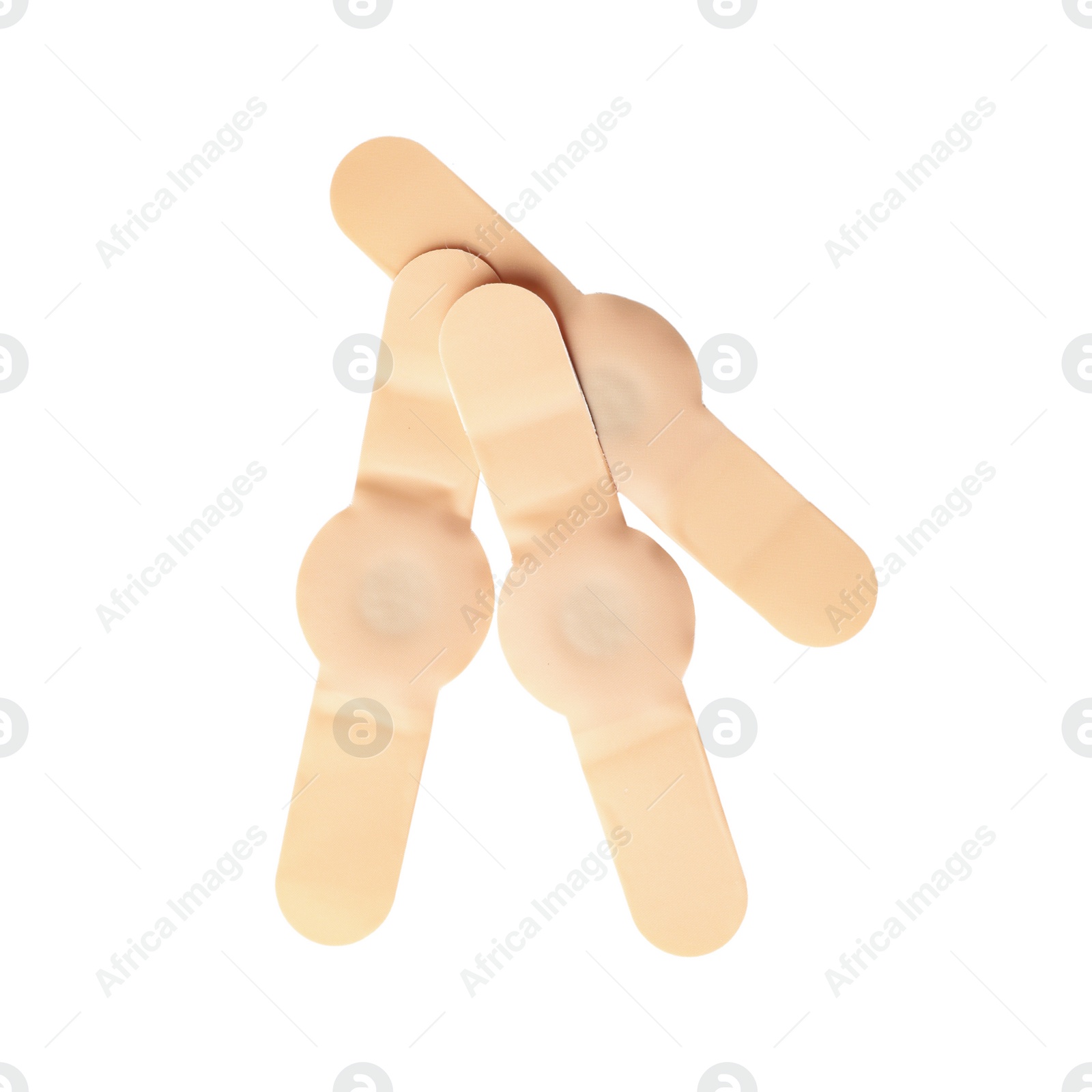 Medical sticking plasters isolated on white. First aid item Photo of Medical sticking plasters isolated on white. First aid item