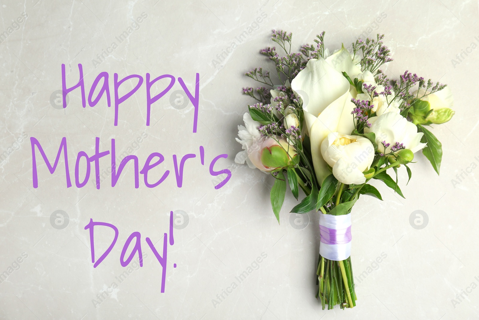 Image of Happy Mother's Day. Bouquet of beautiful flowers on light table, top view