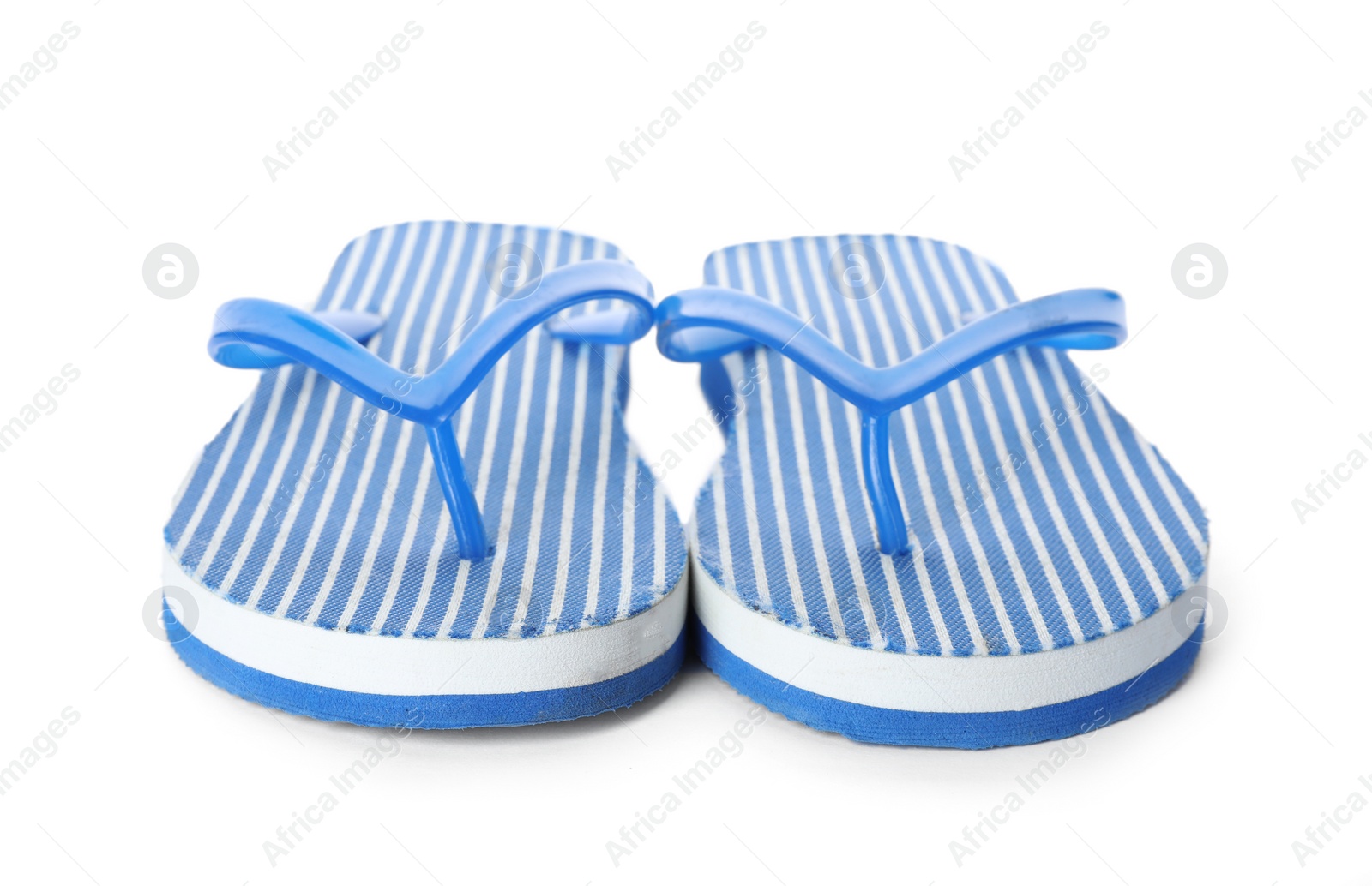 Photo of Bright flip flops on white background. Beach object