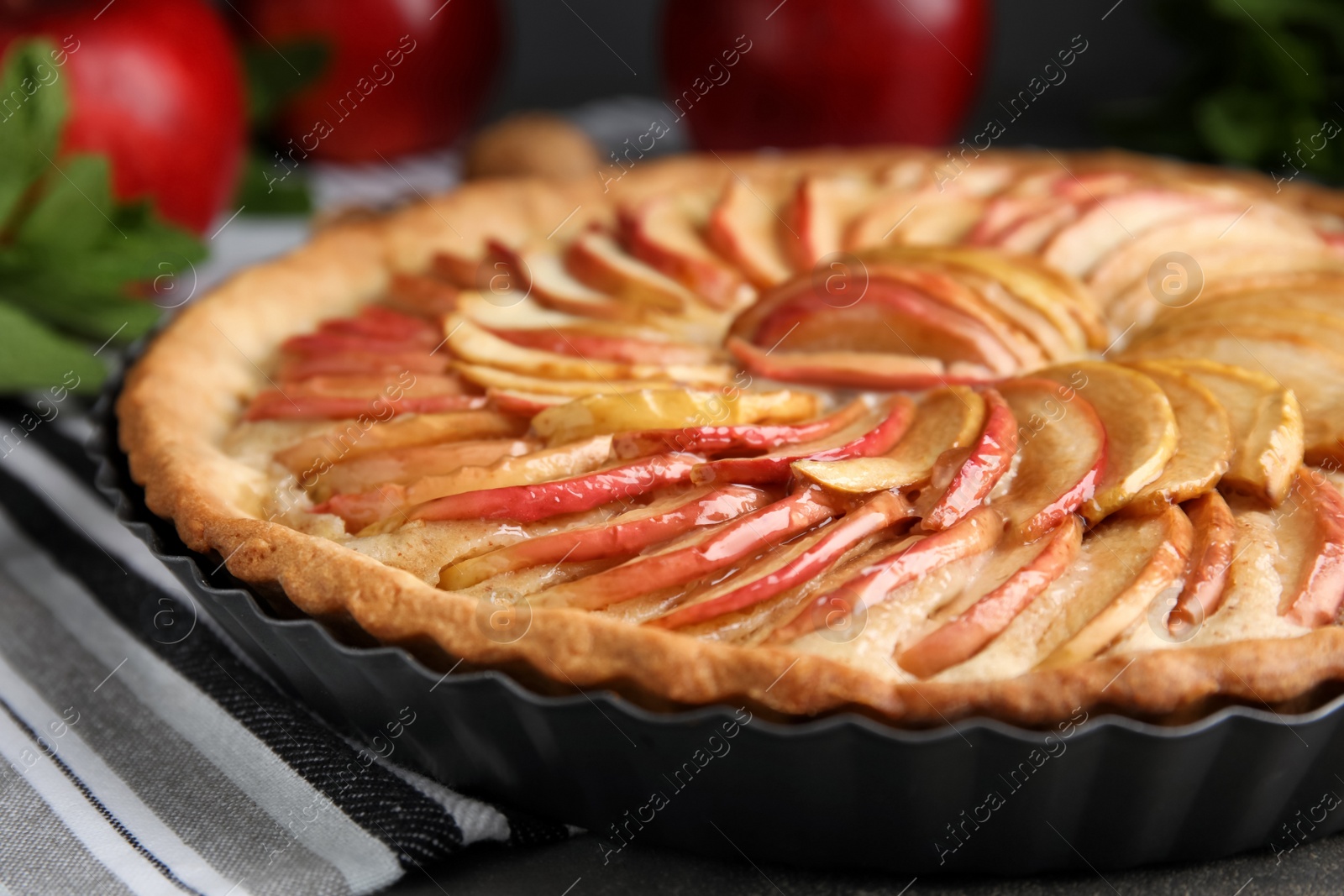 Photo of Delicious homemade apple tart on table, closeup