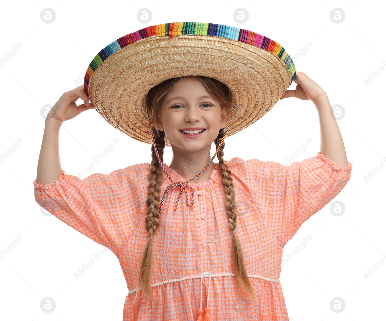 Photo of Cute girl in Mexican sombrero hat on white background