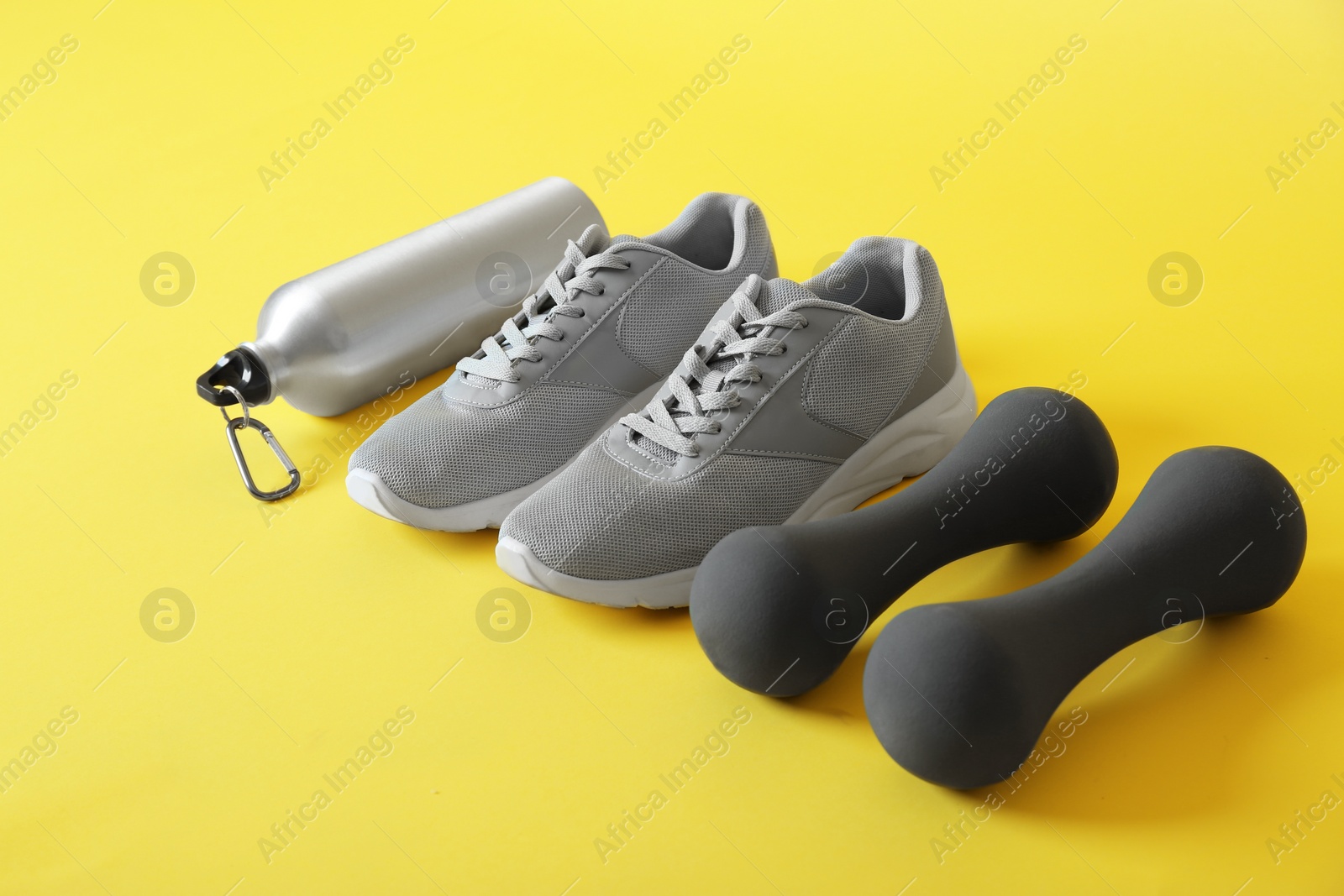 Photo of Fitness equipment on color background. Healthy lifestyle