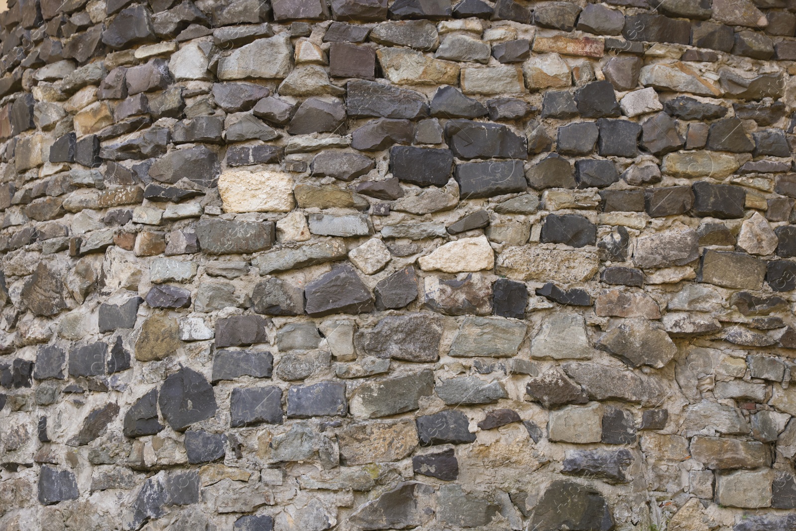 Photo of Texture of grey brick wall as background