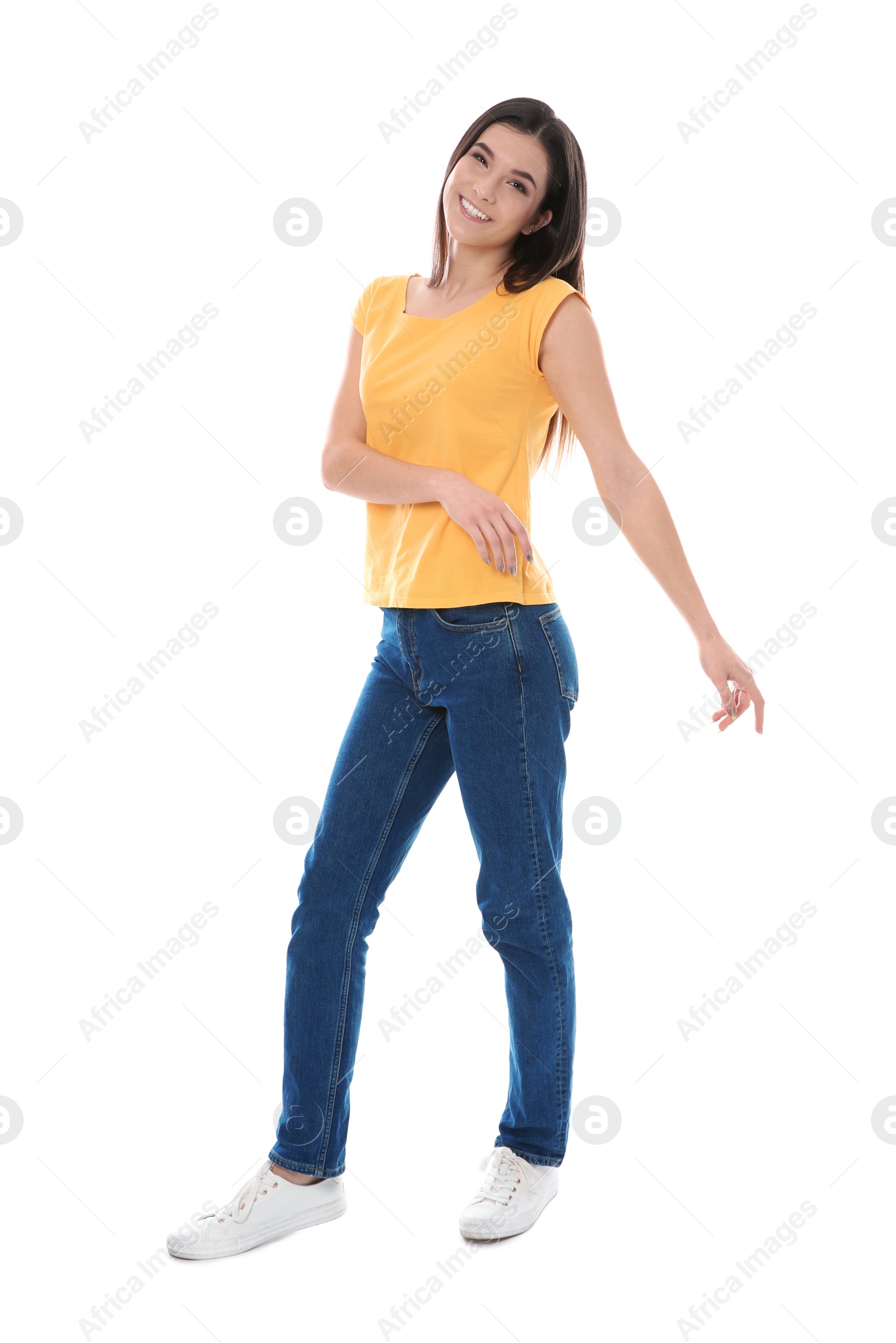 Photo of Beautiful young woman in stylish clothes on white background