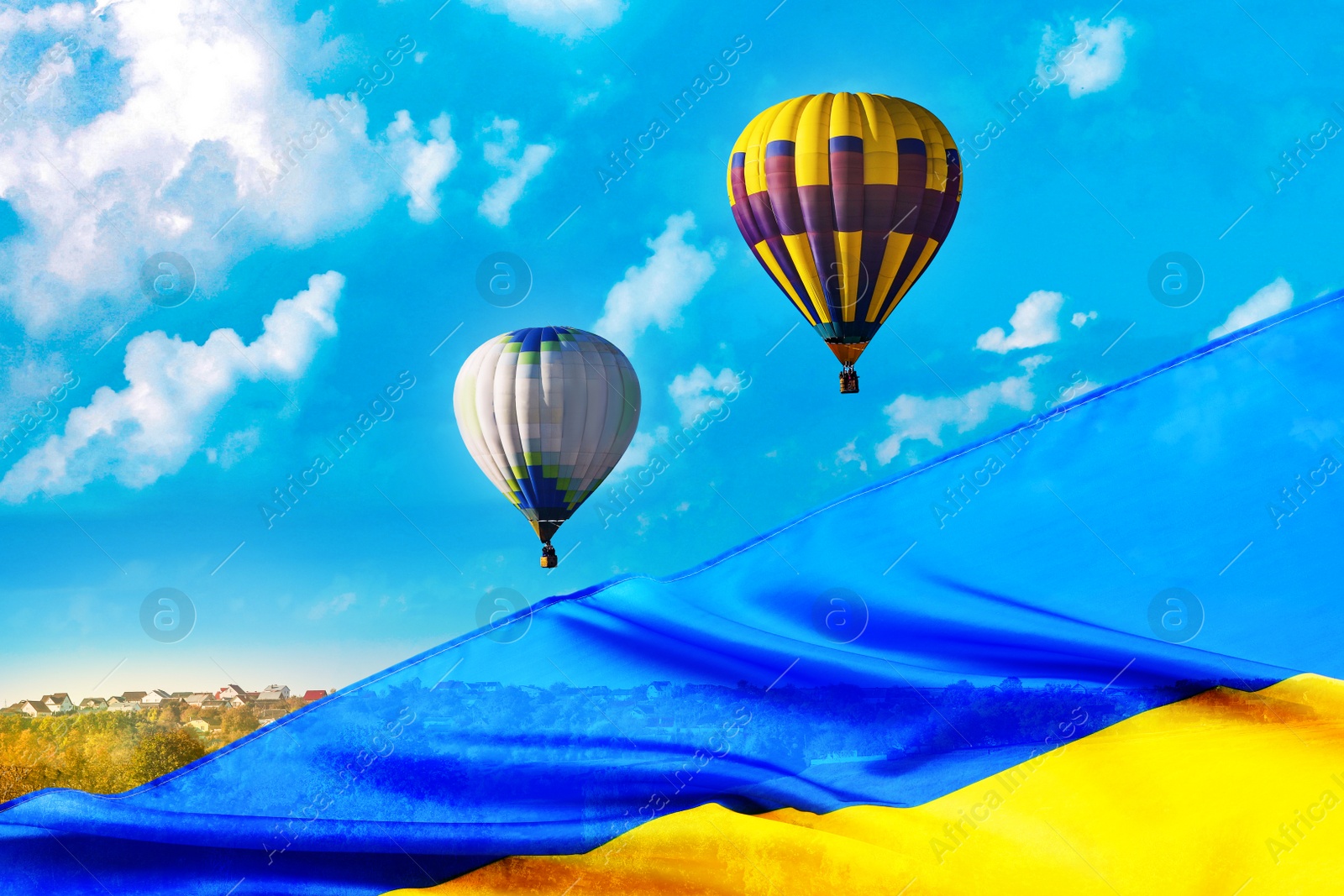 Image of Double exposure of Ukrainian flag and colorful hot air balloons in blue sky