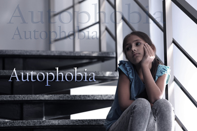 Image of Depressed preteen girl sitting alone on stairs. Autophobia - fear of isolation