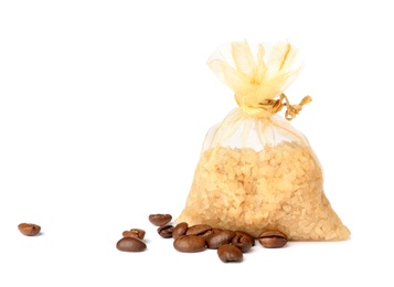 Photo of Scented sachet with aroma beads and coffee beans on white background