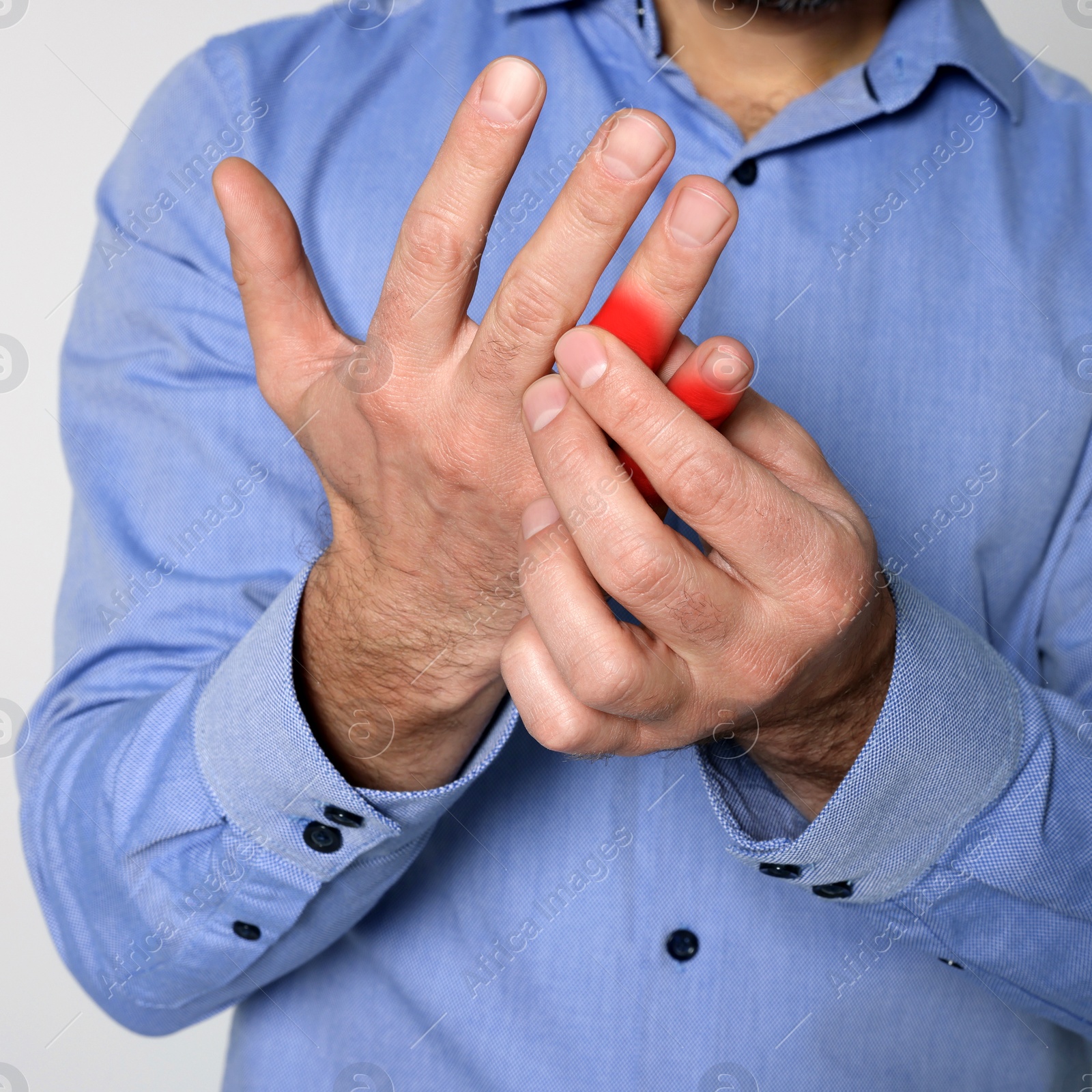 Image of Man suffering from rheumatism on light background, closeup