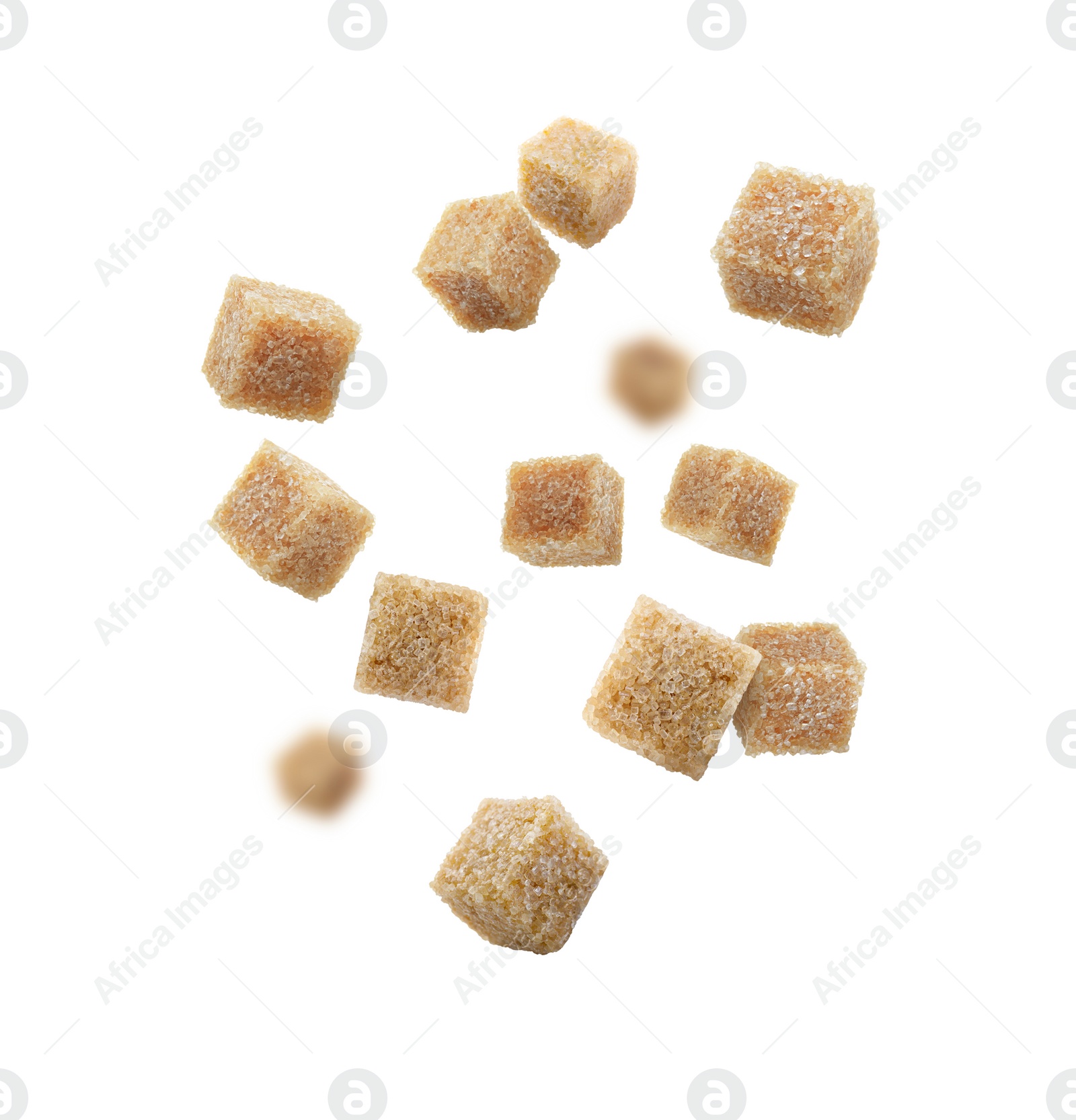 Image of Brown cane sugar cubes falling on white background