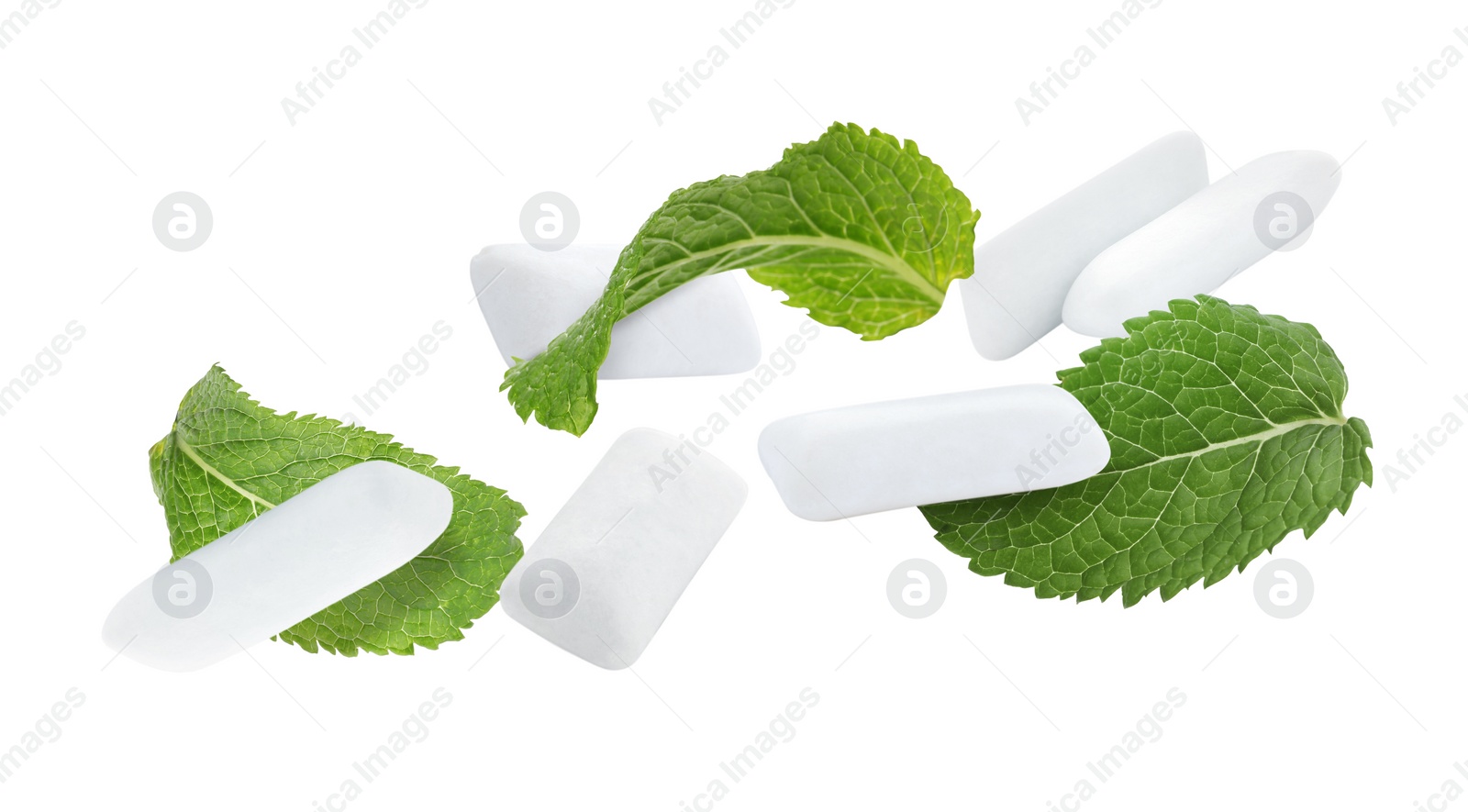 Image of Fresh mint leaves and chewing gum pads falling on white background