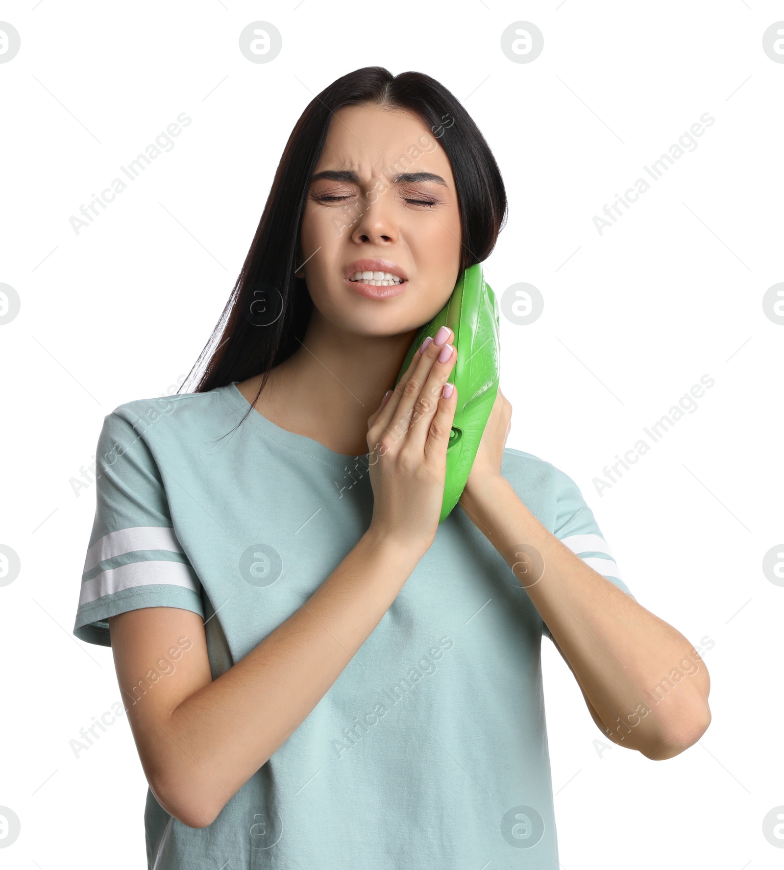 Photo of Woman using hot water bottle to relieve neck pain on white background
