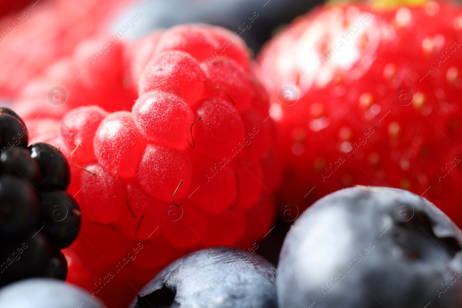 Photo of Different fresh ripe berries as background, macro view