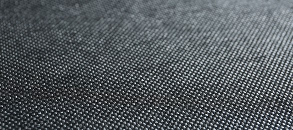 Photo of Texture of dark fabric as background, closeup