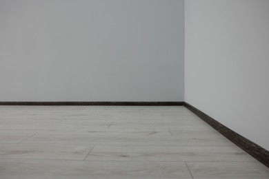 Photo of Empty renovated room with clean light walls