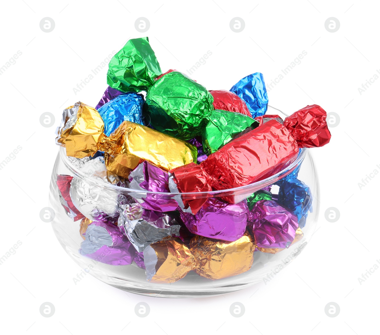 Photo of Bowl with many tasty candies in colorful wrappers isolated on white