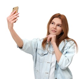 Beautiful woman taking selfie on white background