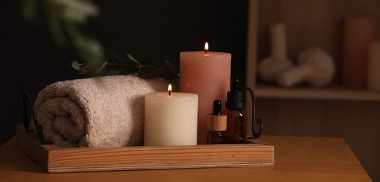 Photo of Beautiful composition with different spa products on wooden table indoors, space for text