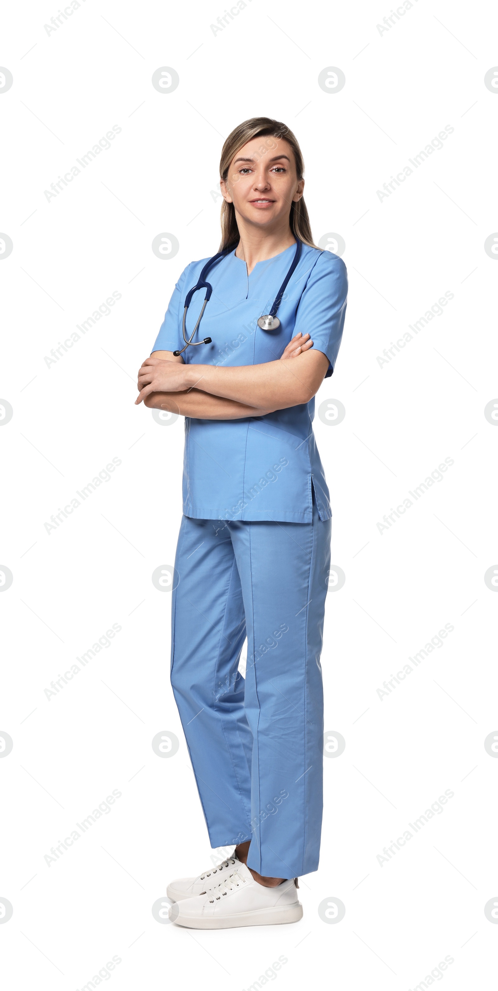 Photo of Portrait of happy doctor with stethoscope on white background