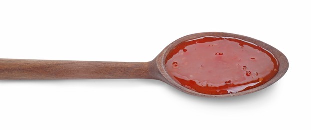 Spicy chili sauce in spoon isolated on white