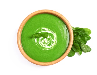 Bowl of healthy green soup with fresh spinach on white background, top view