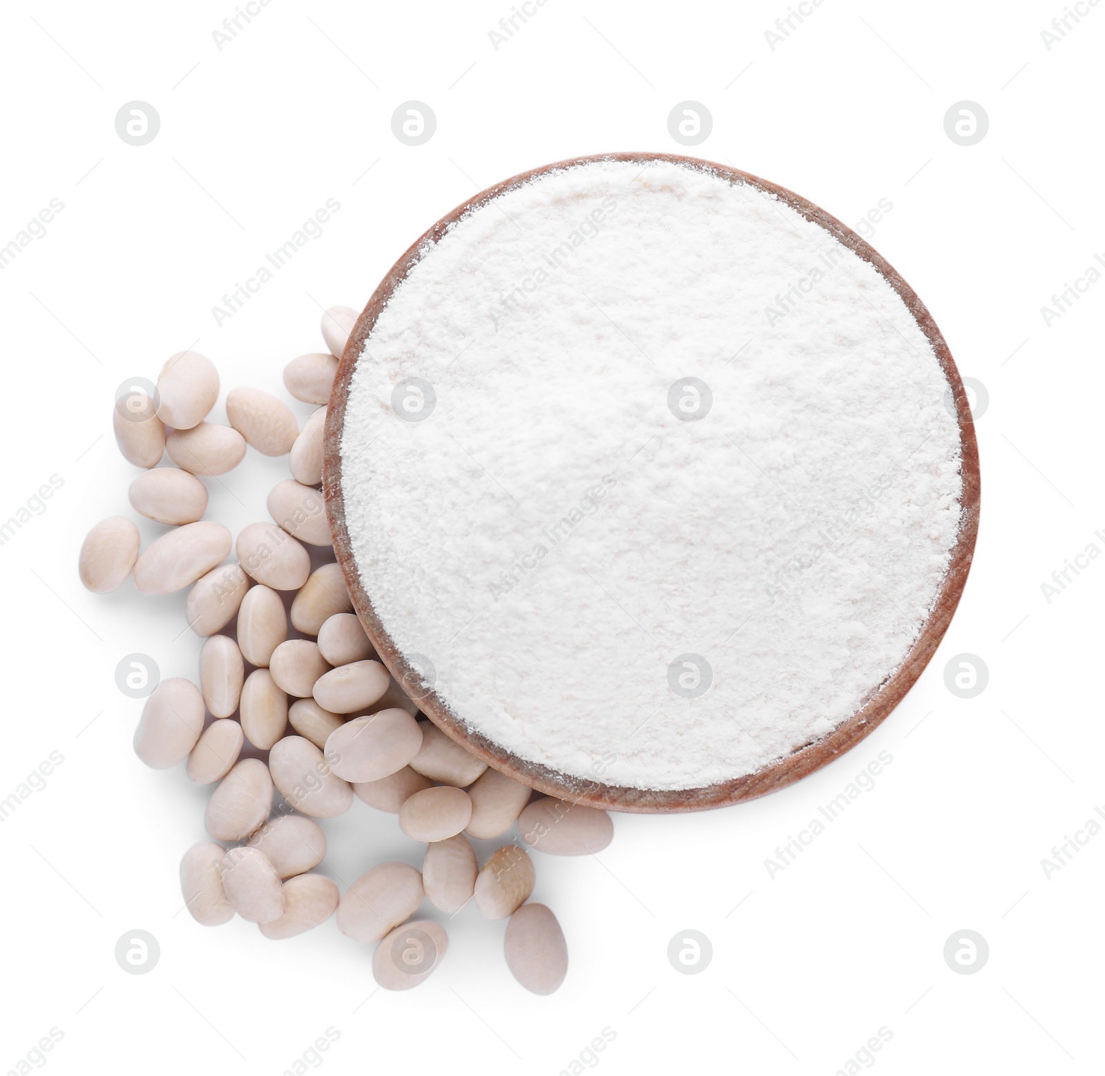 Wooden bowl with flour and kidney beans isolated on white, top view Photo of Wooden bowl with flour and kidney beans isolated on white, top view