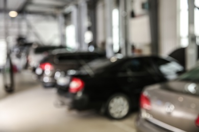 Blurred view of modern automobile repair shop