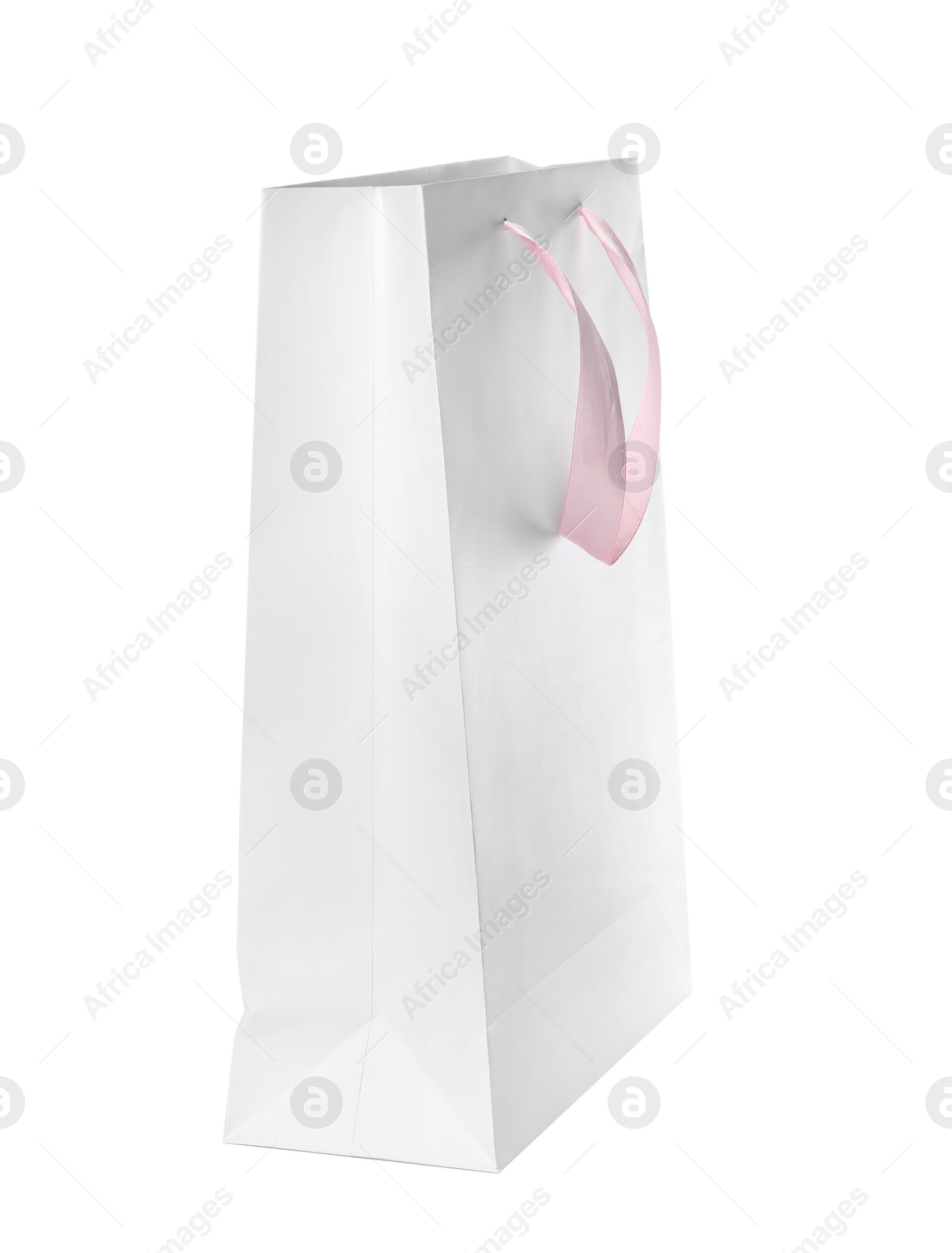 Photo of Paper shopping bag with handles isolated on white