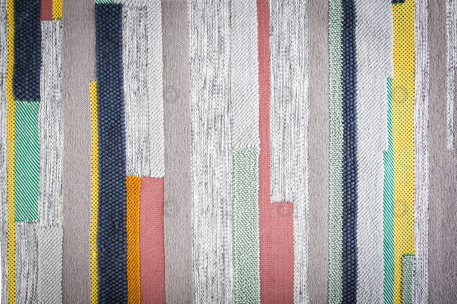 Photo of Colorful striped carpet as background