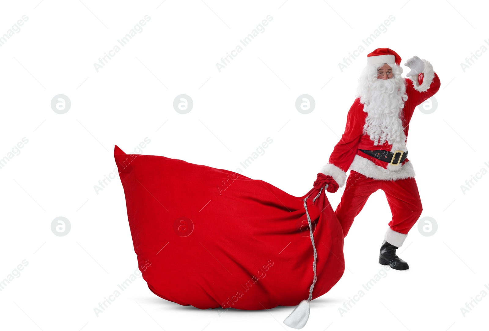 Image of Santa Claus with big red bag full of Christmas presents on white background