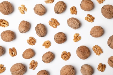 Photo of Flat lay composition with walnuts on white background