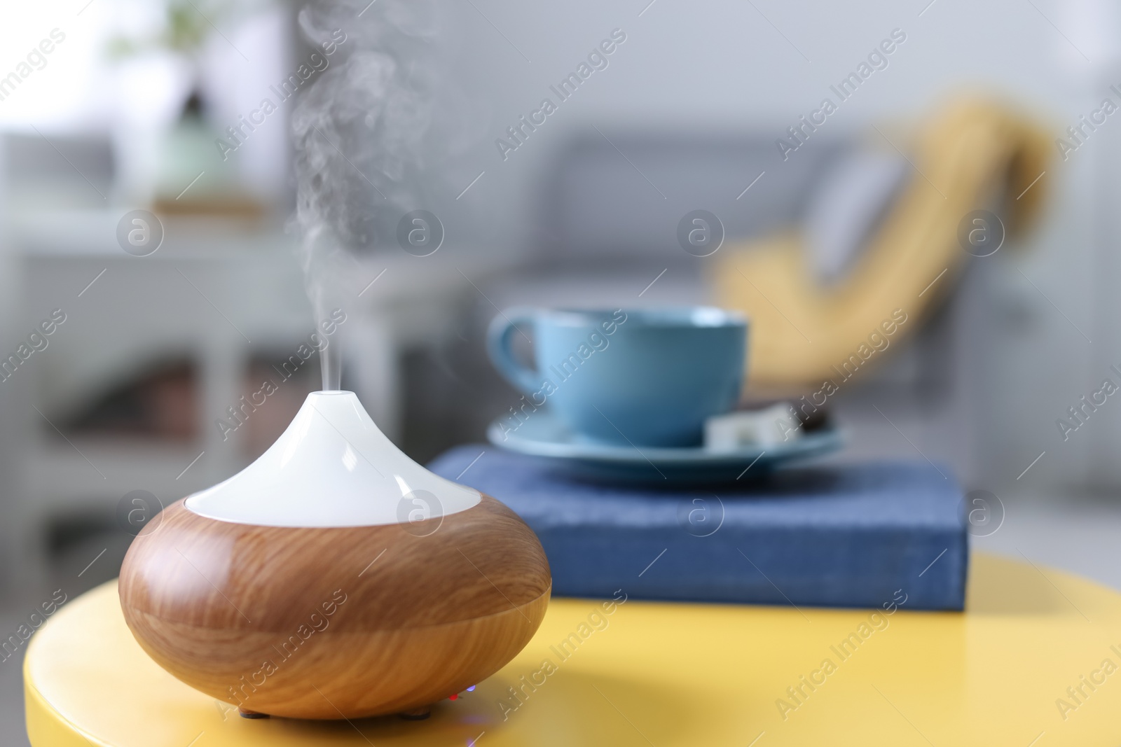 Photo of Humidifier on table at home