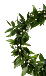 Beautiful handmade mistletoe wreath on white background. Traditional Christmas decor