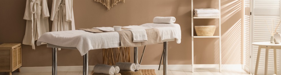 Image of Spa cabinet interior with massage table in wellness center. Banner design