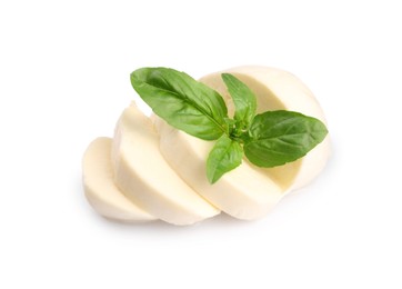 Slices of tasty mozzarella and basil leaves isolated on white