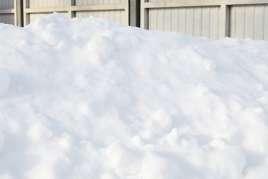 Photo of Beautiful snowdrift outdoors, closeup view. Winter season