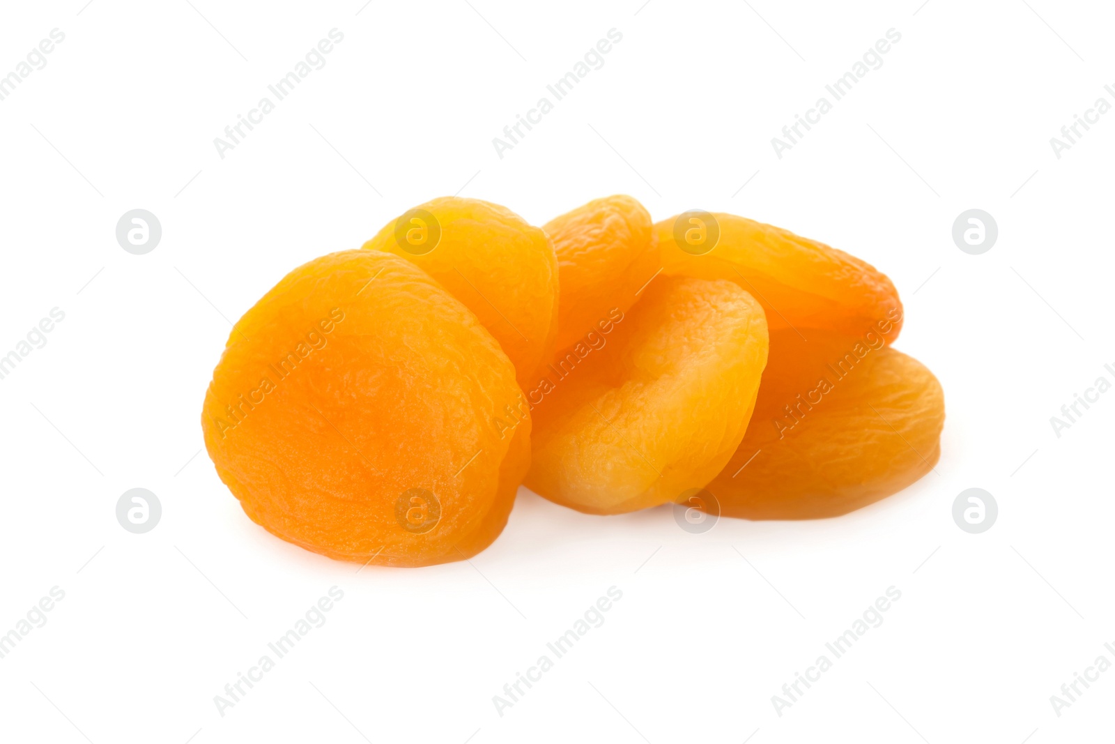 Photo of Pile of tasty apricots on white background. Dried fruits